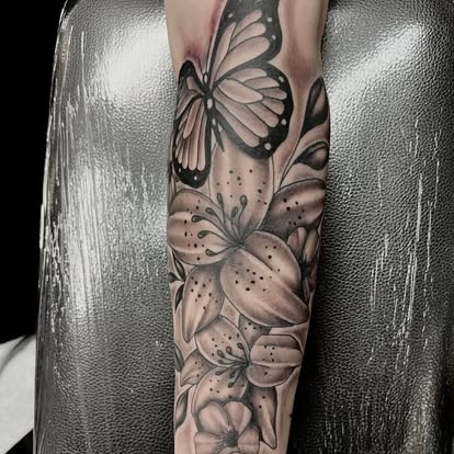 Fine line floral tattoo
